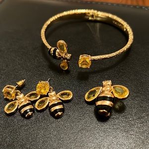 Pin, earrings, and bracelet